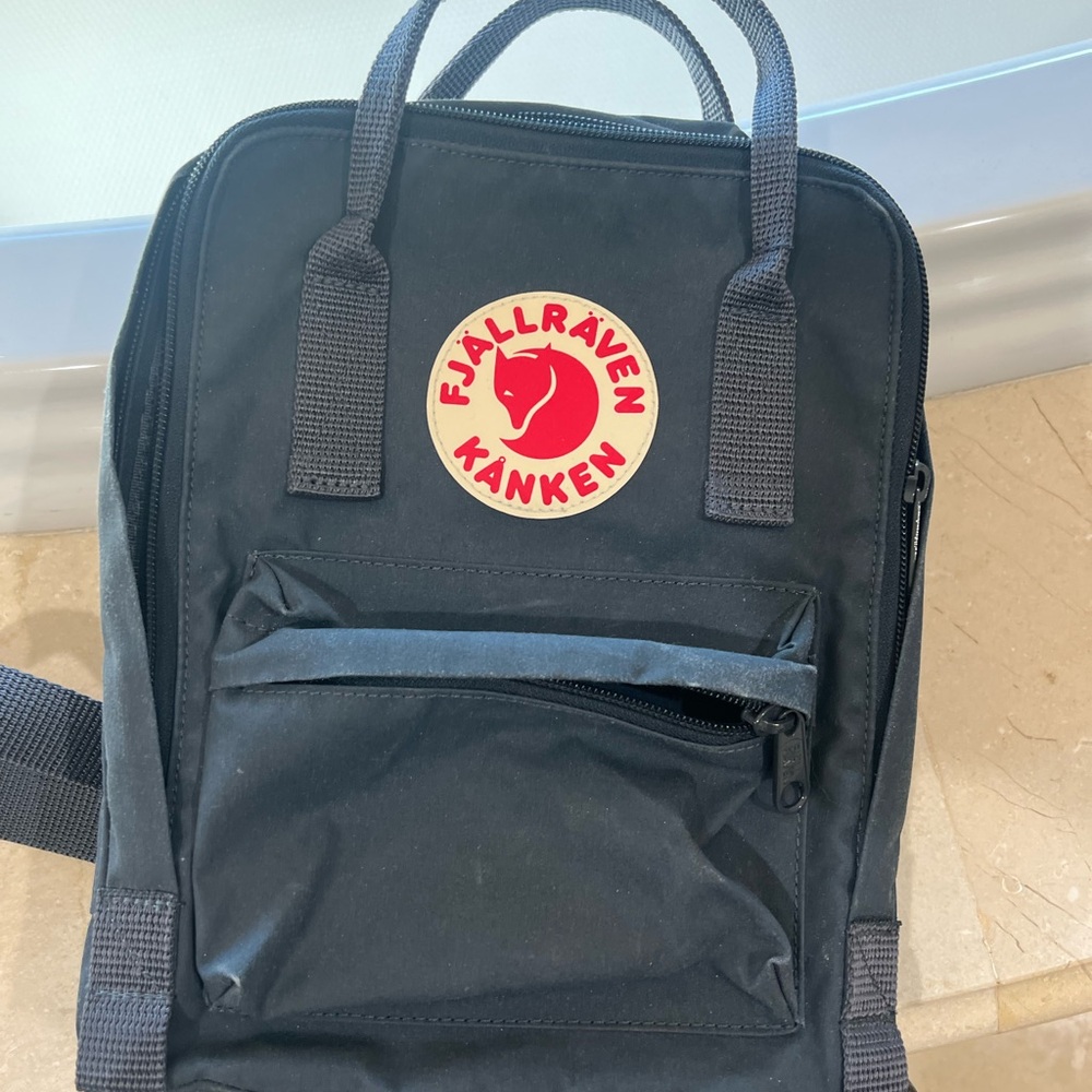 Black Backpack with Durable Fabric and Classic Design